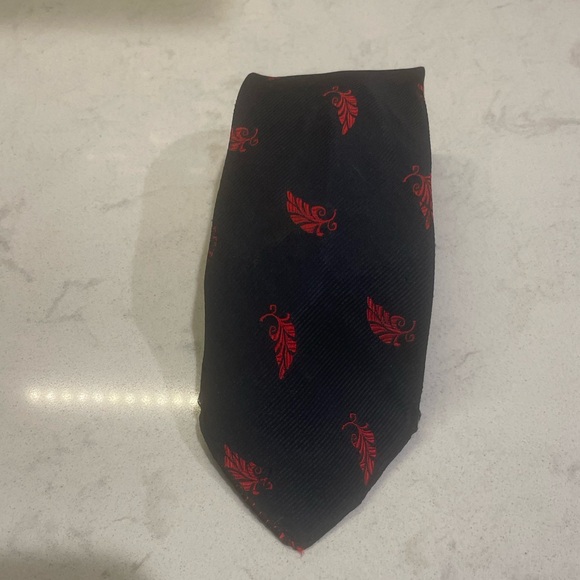 Quality Neckwear by Disney, Pinocchio’s Feather Silk tie Constructed By Tooke - Picture 1 of 5